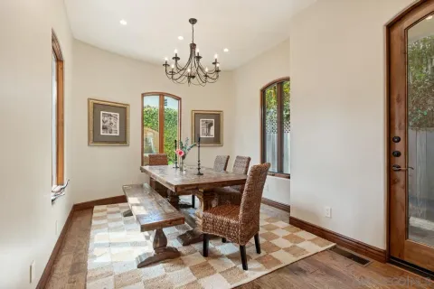 a view of house with outdoor seating and entertaining space