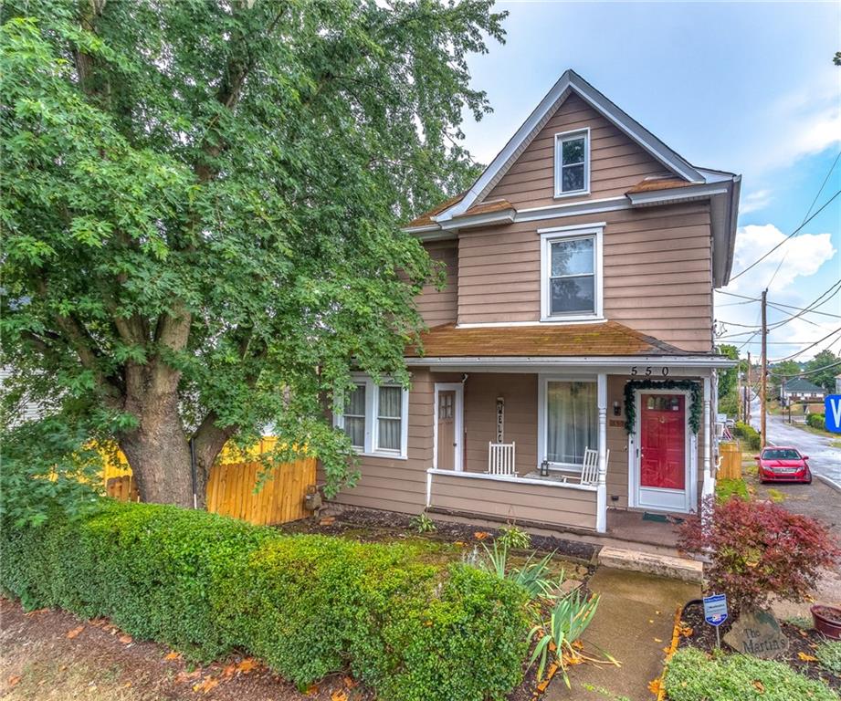 550 Virginia Avenue Rochester, PA 15074 - Photo 1 of 24 a front view of a house with garden