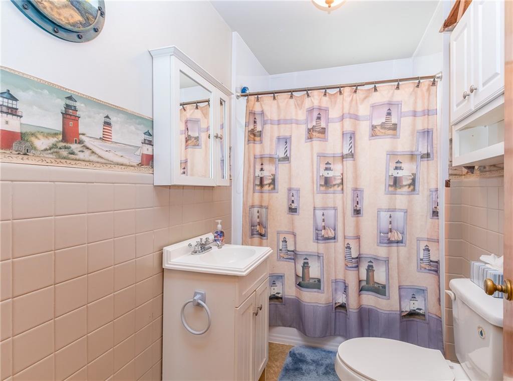 550 Virginia Avenue Rochester, PA 15074 - Photo 11 of 24 a bathroom with a sink toilet and shower
