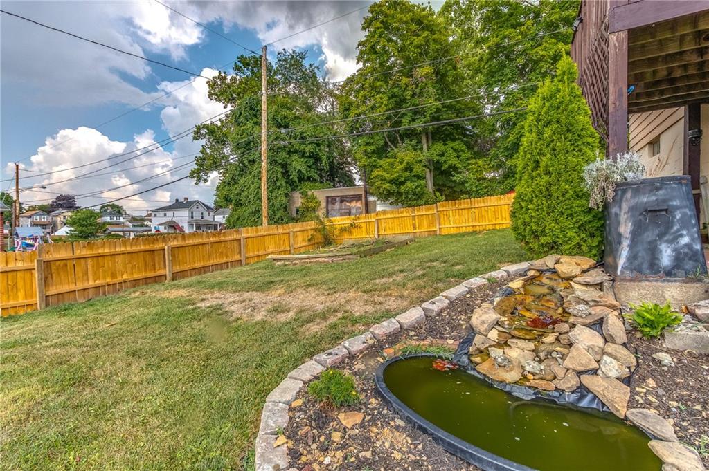 550 Virginia Avenue Rochester, PA 15074 - Photo 24 of 24 a swimming pool with outdoor seating and plants