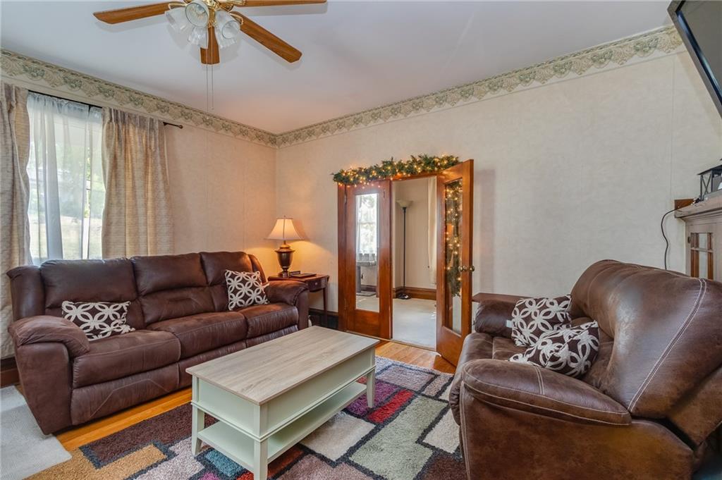 550 Virginia Avenue Rochester, PA 15074 - Photo 4 of 24 a living room with furniture and a rug