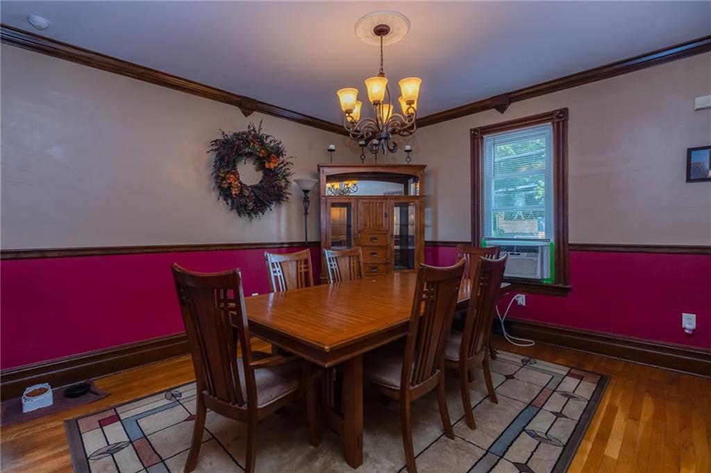 550 Virginia Avenue Rochester, PA 15074 - Photo 6 of 24 a view of a dining room with furniture and chandelier