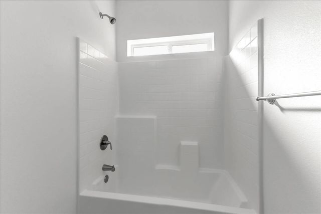 a close up of a bathtub in a bathroom