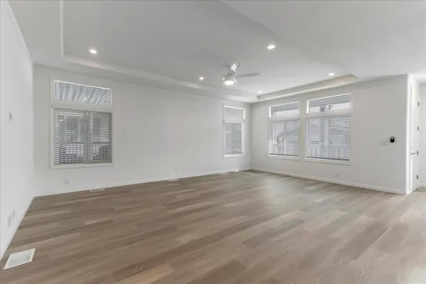 a view of an empty room with a window