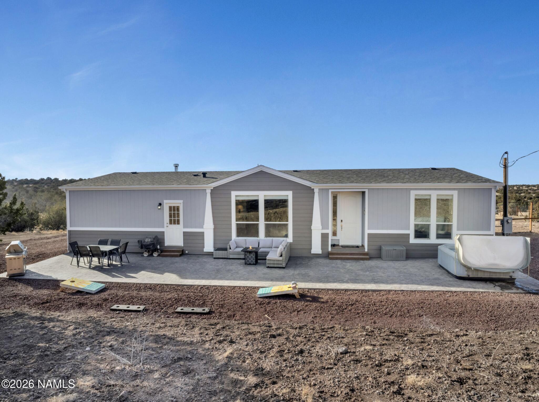 a front view of a house with patio