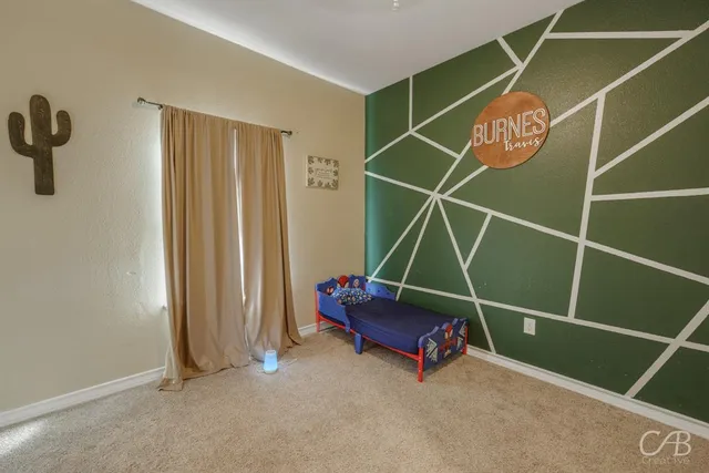 a room with gym equipment and shower