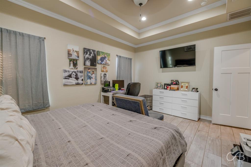 625 Jarrell Court Tuscola, TX 79562 - Photo 24 of 32 a bedroom with a bed and furniture