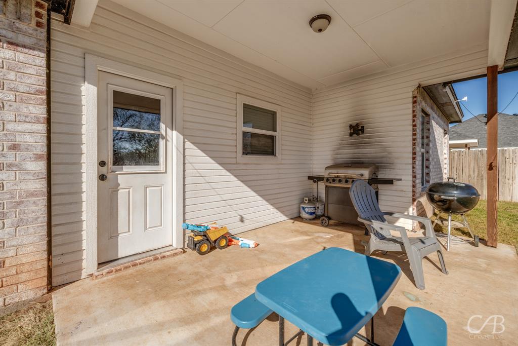 625 Jarrell Court Tuscola, TX 79562 - Photo 28 of 32 a view of a workspace with furniture and a window