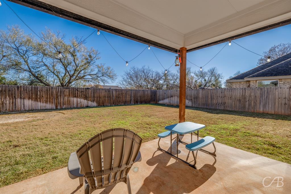 625 Jarrell Court Tuscola, TX 79562 - Photo 29 of 32 a swimming pool with wooden fence