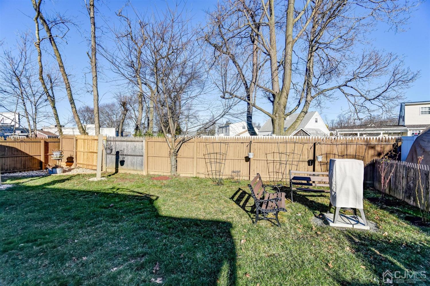24 Racetrack Road East Brunswick, NJ 08816 - Photo 36 of 37 a view of backyard with deck