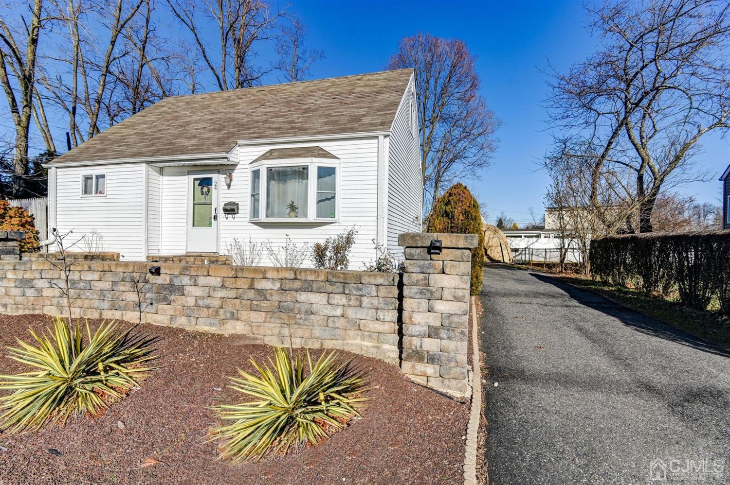 24 Racetrack Road East Brunswick, NJ 08816 - Photo 4 of 37 a view of house with outdoor space and sitting space