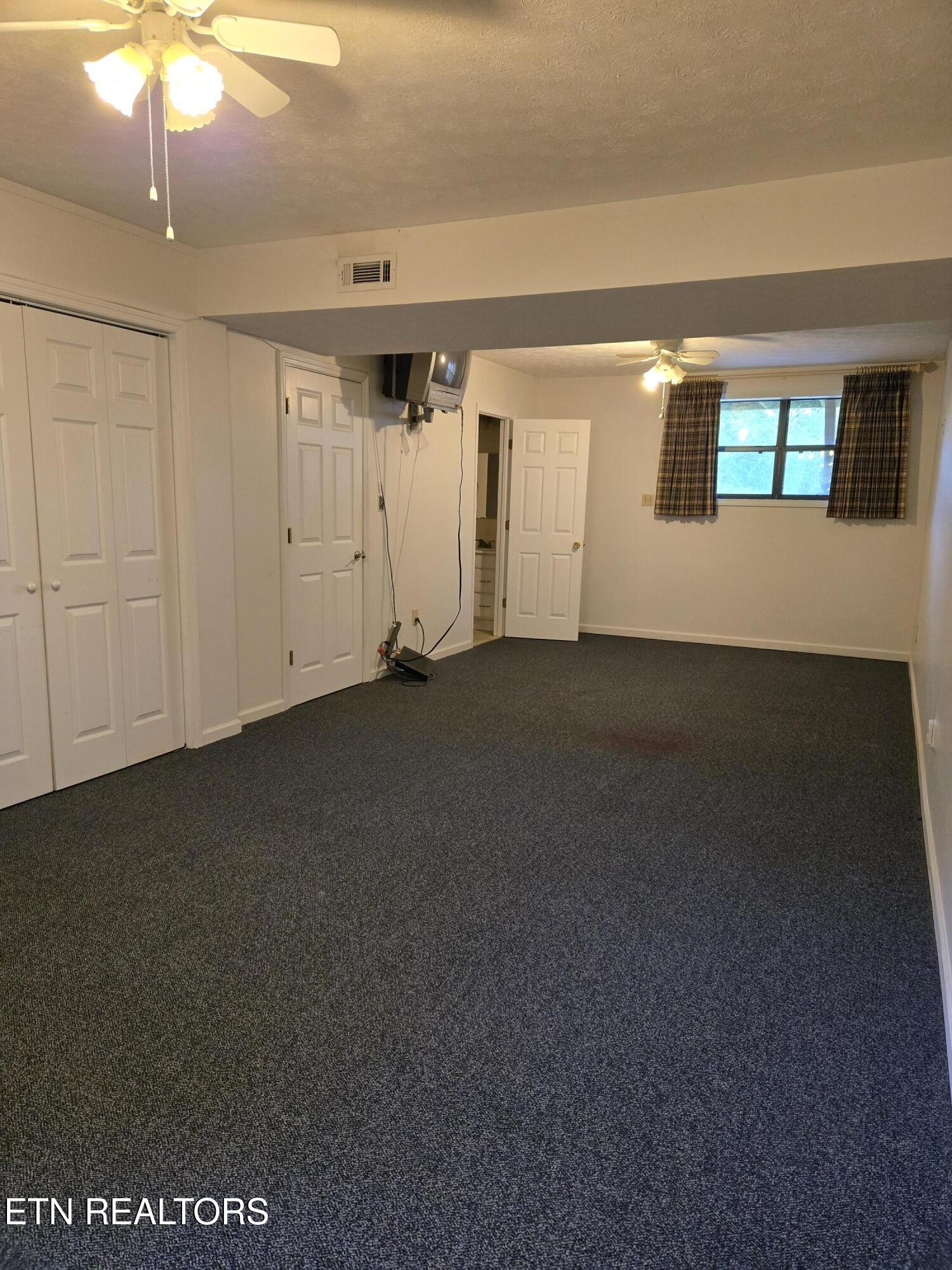 7760 Cranley Road Powell, TN 37849 - Photo 5 of 19 Large basement bedroom