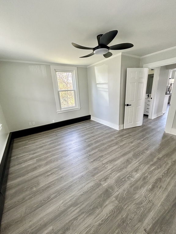 16 North Street West Springfield, MA 01089 - Photo 13 of 28 an empty room with wooden floor and windows