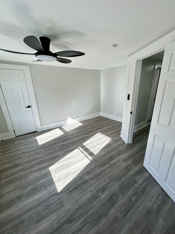 16 North Street West Springfield, MA 01089 - Photo 15 of 28 a view of an empty room with wooden floor and a window