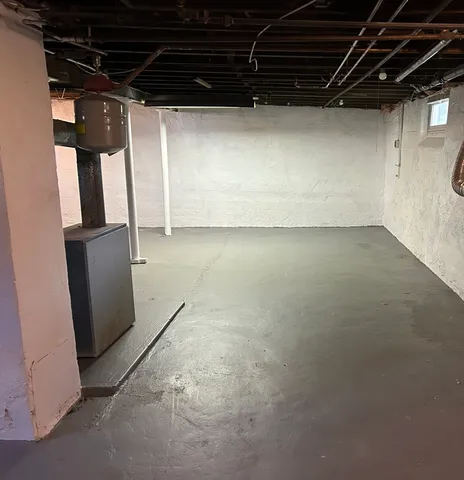 a view of a empty room with wooden walls