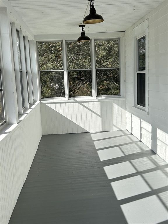 16 North Street West Springfield, MA 01089 - Photo 4 of 28 a view of a kitchen with granite countertop a refrigerator a sink and windows