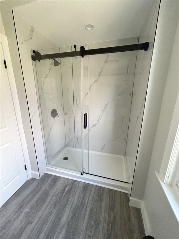 16 North Street West Springfield, MA 01089 - Photo 10 of 28 a bathroom with a glass shower door
