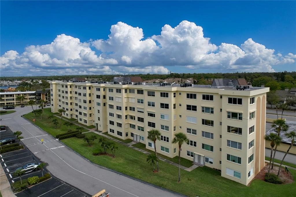 4650 Cove Circle, Unit 209 St. Petersburg, FL 33708 - Photo 33 of 54 a view of a city