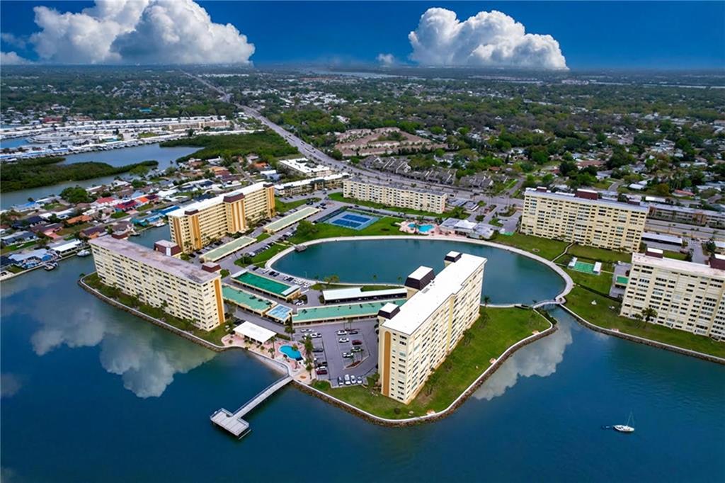 4650 Cove Circle, Unit 209 St. Petersburg, FL 33708 - Photo 34 of 54 an aerial view of a house