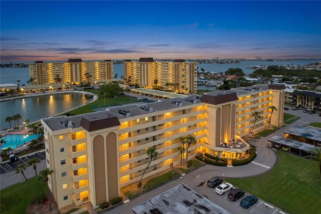 4650 Cove Circle, Unit 209 St. Petersburg, FL 33708 - Photo 43 of 54 a view of a house with outdoor space