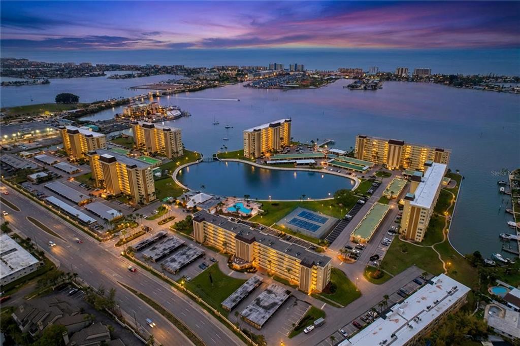 4650 Cove Circle, Unit 209 St. Petersburg, FL 33708 - Photo 45 of 54 a view of a city with an ocean