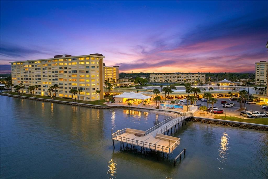 4650 Cove Circle, Unit 209 St. Petersburg, FL 33708 - Photo 52 of 54 a view of a lake with a water view