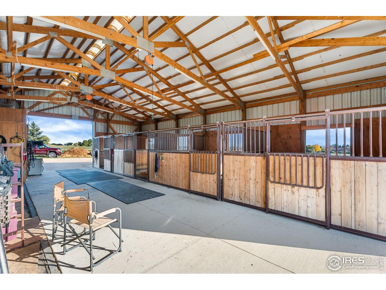 12625 Vermillion Road Longmont, CO 80504 - Photo 12 of 50 a view of a porch with furniture