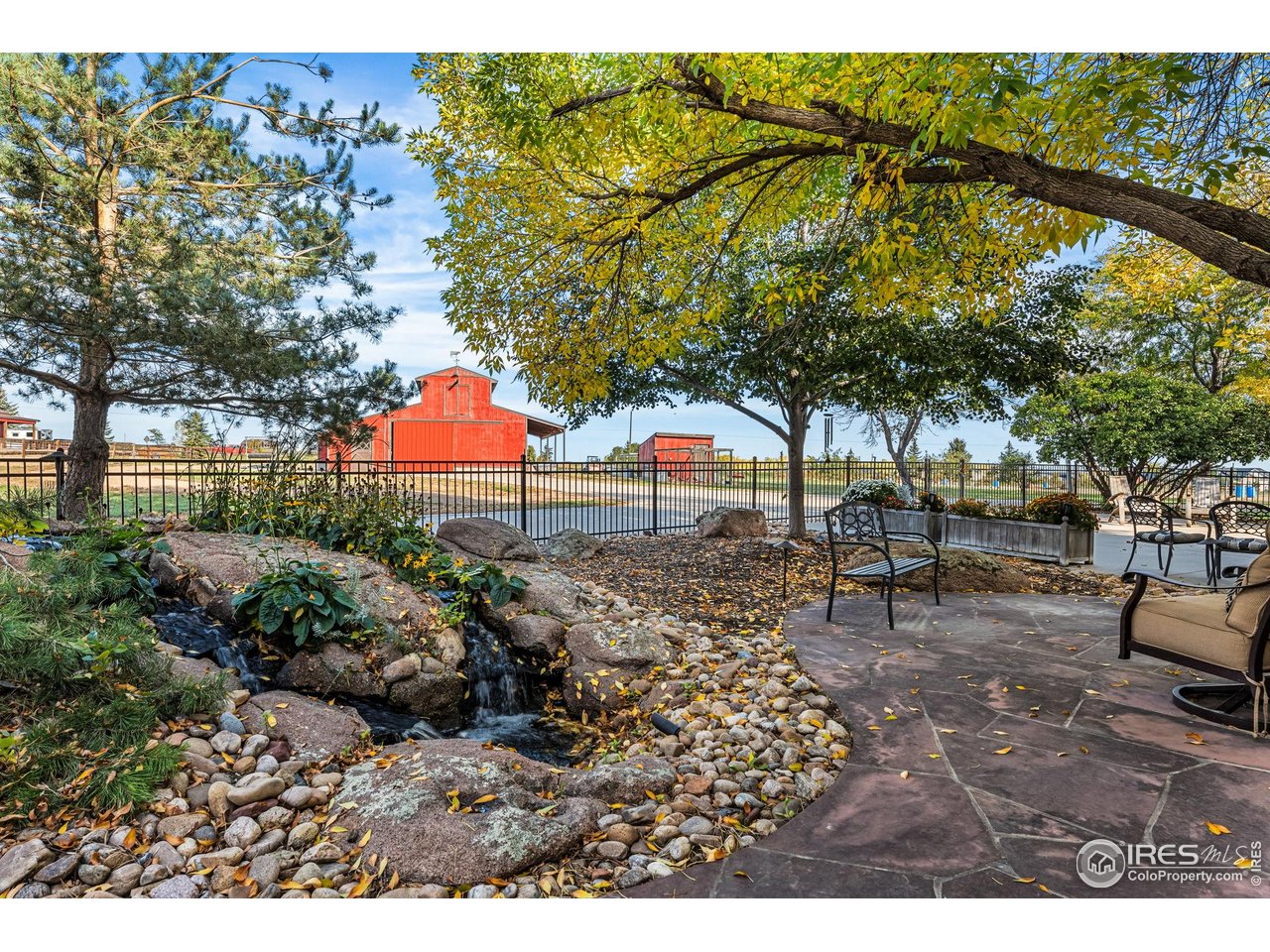 12625 Vermillion Road Longmont, CO 80504 - Photo 37 of 50 a backyard of a house with lots of green space