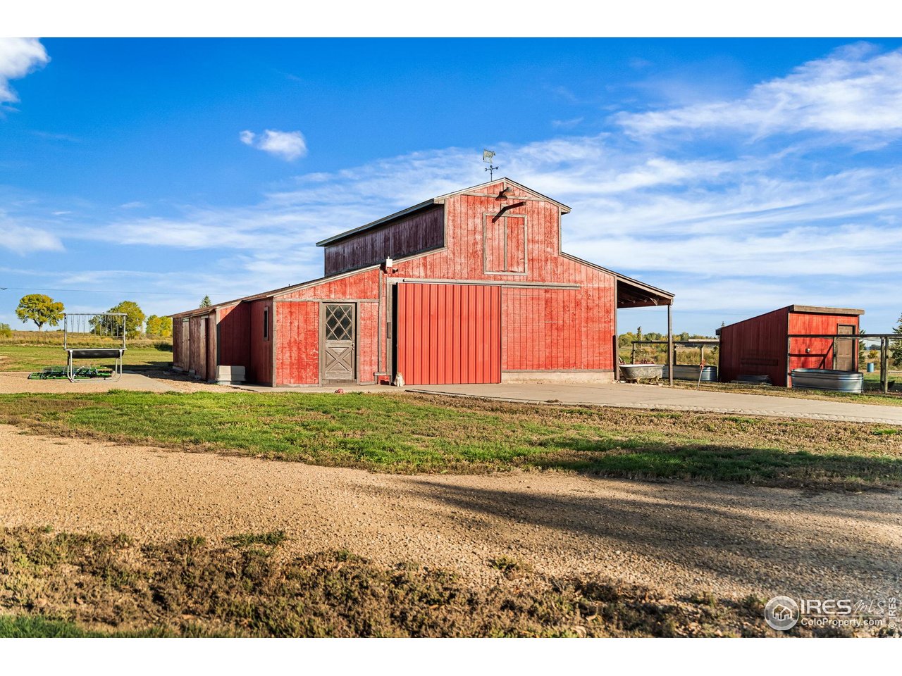 12625 Vermillion Road Longmont, CO 80504 - Photo 46 of 50 a front view of a house with a garden