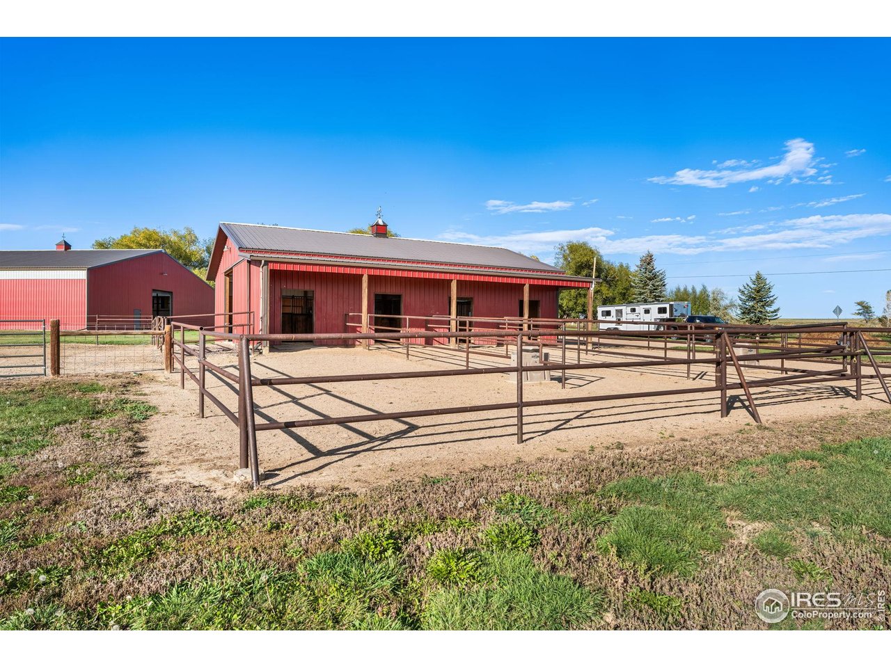 12625 Vermillion Road Longmont, CO 80504 - Photo 47 of 50 a view of a house with backyard and sitting area