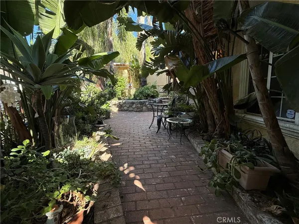 a view of a backyard of the house