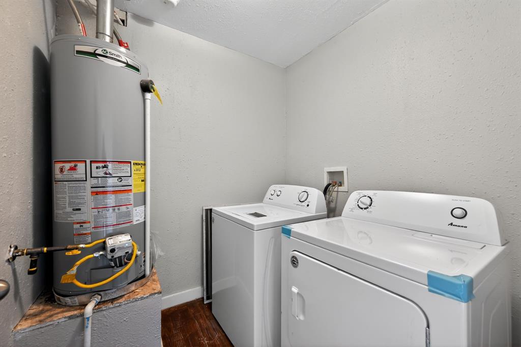 205 South Mable Street Ferris, TX 75125 - Photo 23 of 31 a utility room with dryer and washer