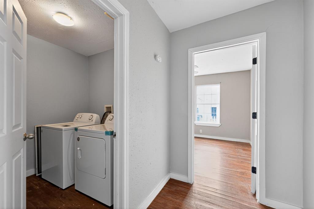 205 South Mable Street Ferris, TX 75125 - Photo 24 of 31 a view of bathroom with washer and dryer