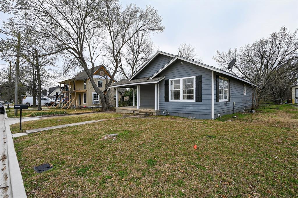 205 South Mable Street Ferris, TX 75125 - Photo 27 of 31 a view of a house with a yard