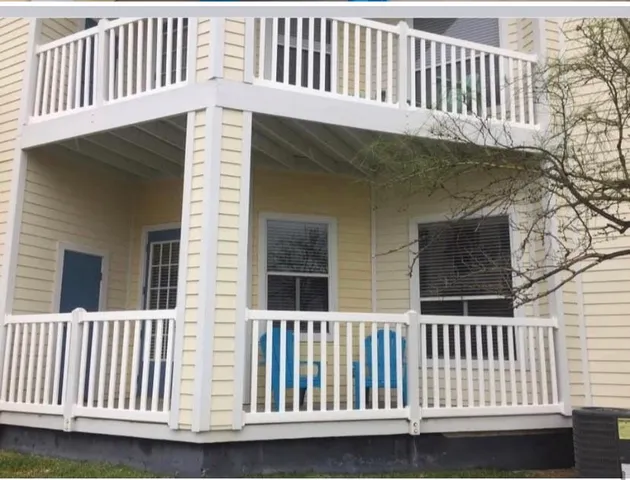 a view of a house with a porch