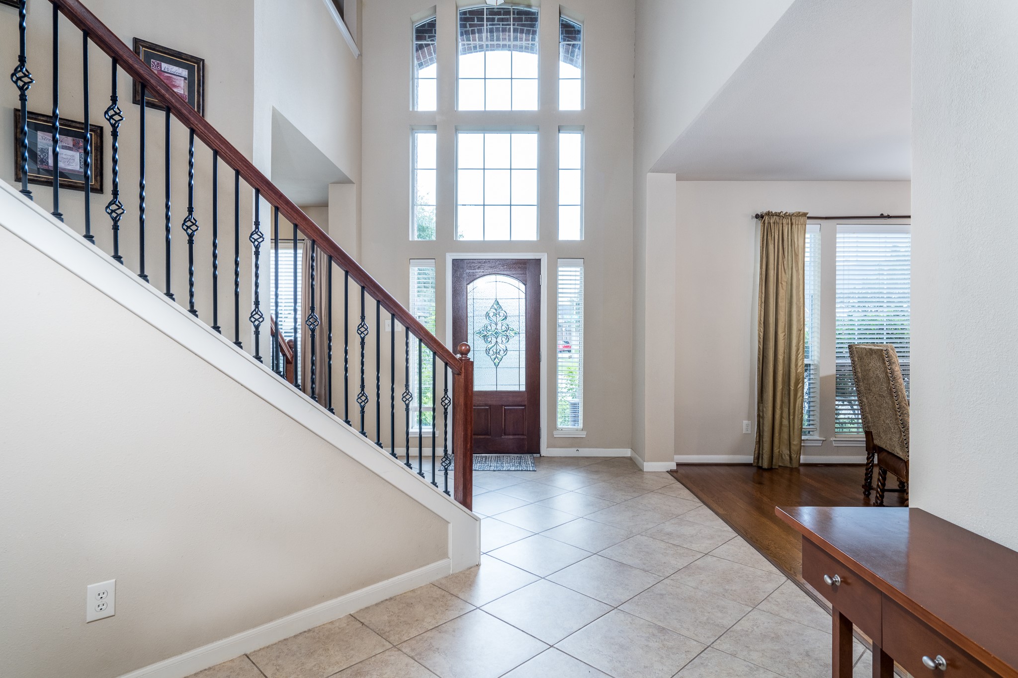 907 Colorado Springs Court Spring, TX 77373 - Photo 6 of 34 The floor to ceiling windows provide tons of natural light.