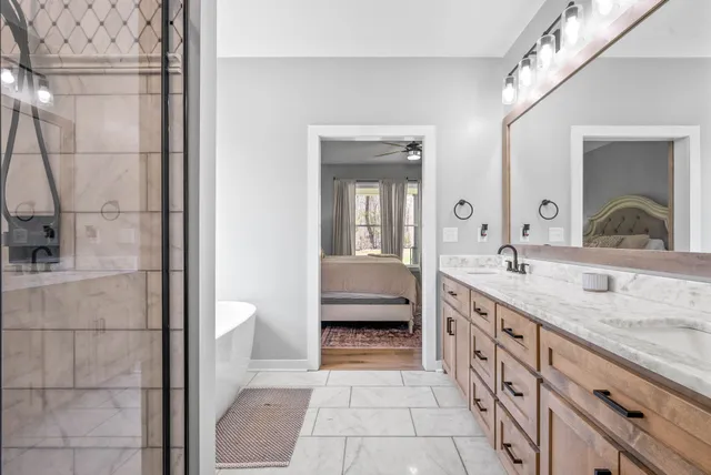a white bath tub sitting in a bathroom