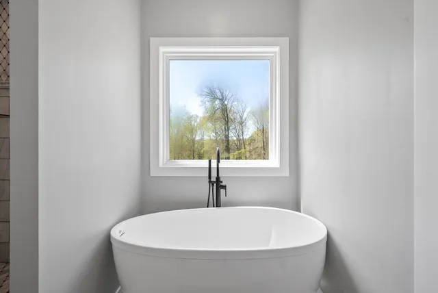 a bedroom with furniture and a bed