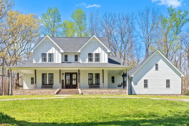 front view of a house with a yard