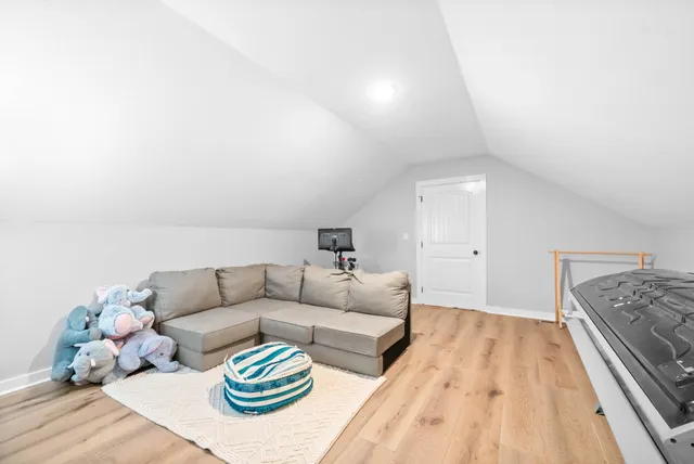 a view of a swimming pool with a lounge chair