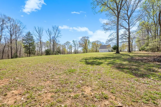 a view of swimming pool with an outdoor space and seating area