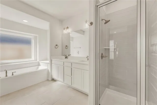 a bathroom with a shower tub and sink