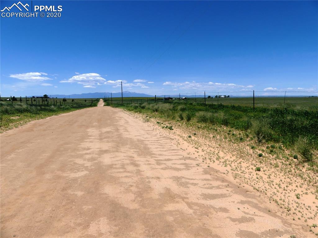 30150 Antioch Road Yoder, CO 80864 - Photo 28 of 36 Unmaintained portion of Antioch Road looking west - Pikes Peak