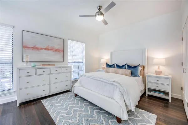 a bedroom with a bed and a dresser