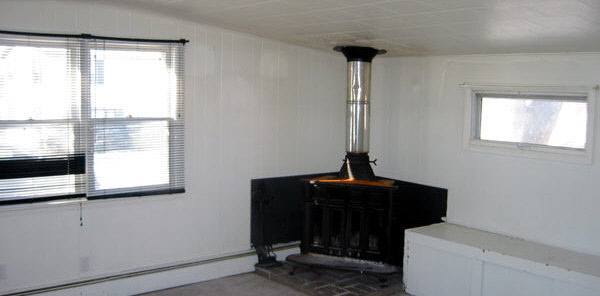 209 Jefferson Street Ridott, IL 61067 - Photo 2 of 5 a room with a window and a bath tub
