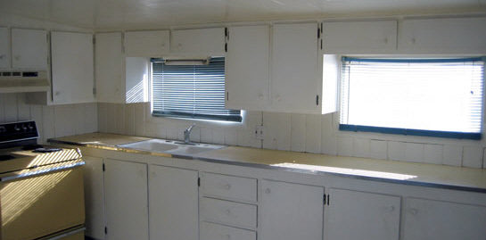 209 Jefferson Street Ridott, IL 61067 - Photo 3 of 5 a room with storage and utility