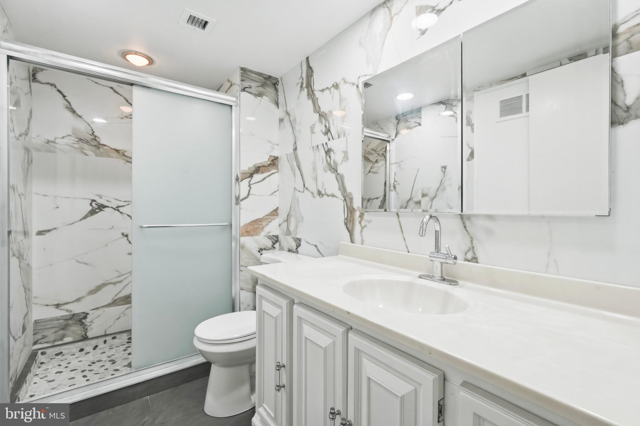 41 Conshohocken State Road, Unit 503 Bala Cynwyd, PA 19004 - Photo 12 of 24 Newer Hall Bathroom