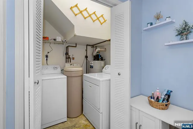 a room with dryer and washer