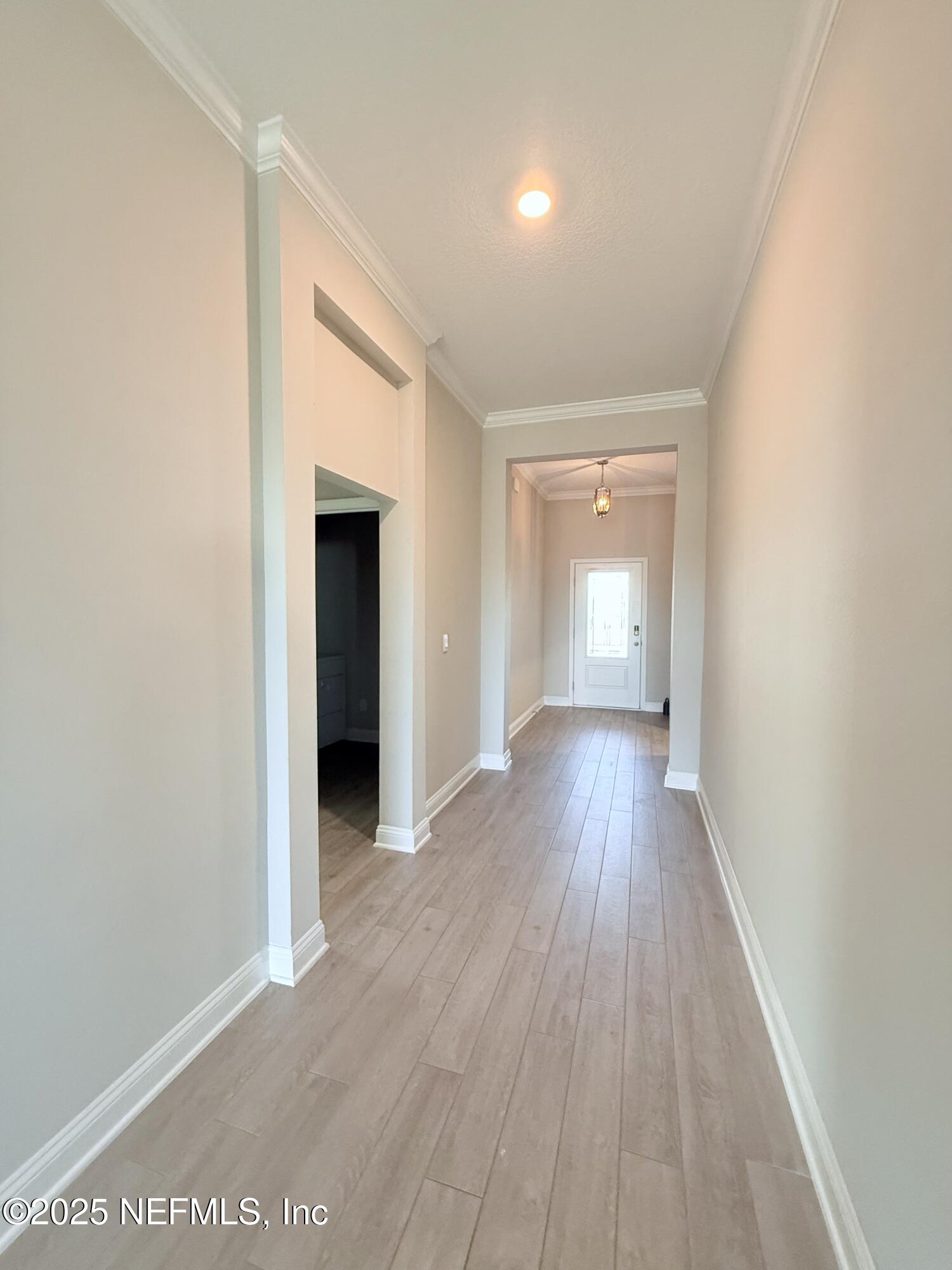 23 Alagon Way Street St. Augustine, FL 32084 - Photo 13 of 39 a view of a hallway with wooden floor