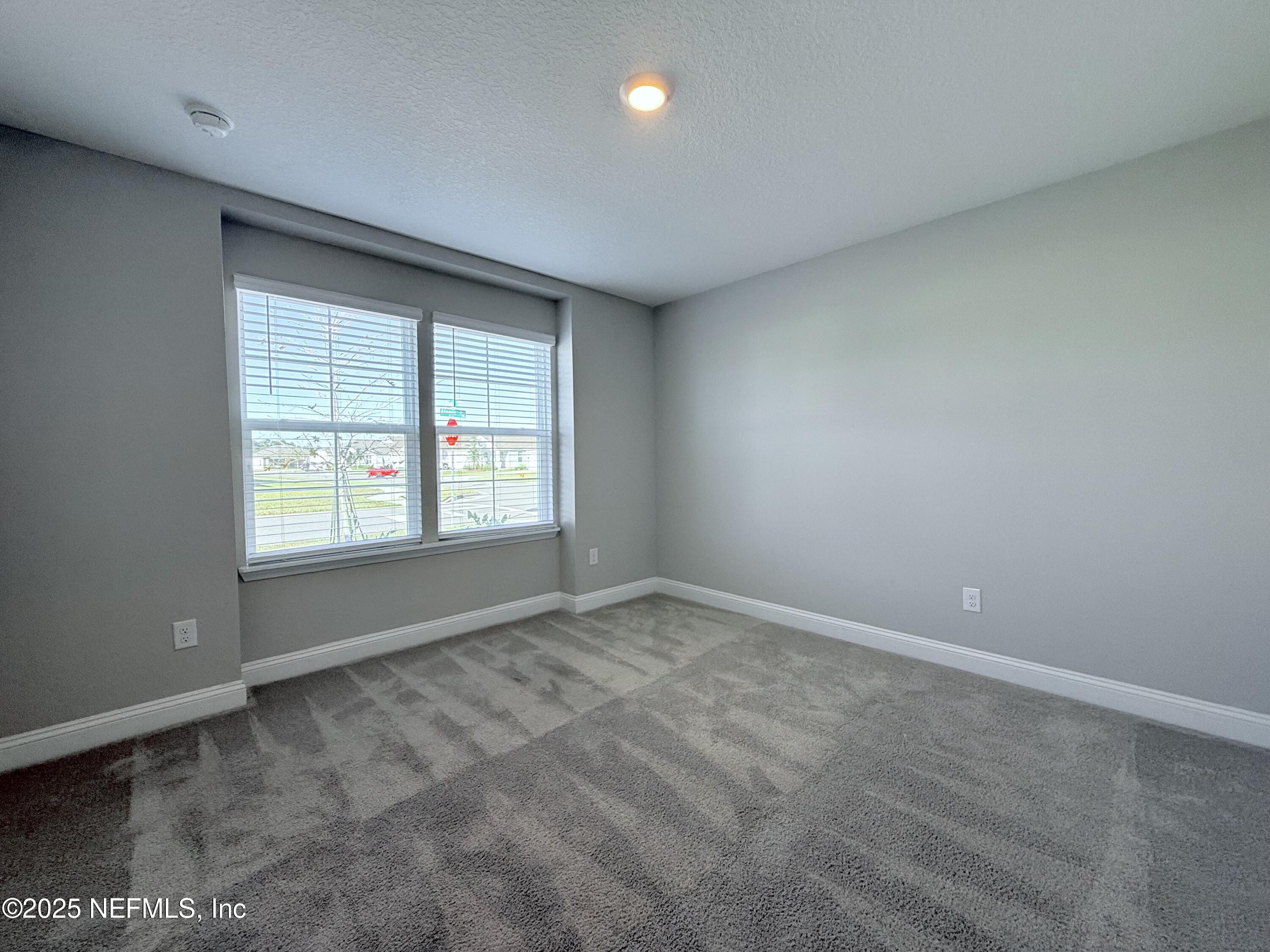 23 Alagon Way Street St. Augustine, FL 32084 - Photo 14 of 39 an empty room with windows